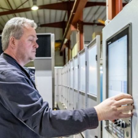 worker using a digital screen in a warehouse
